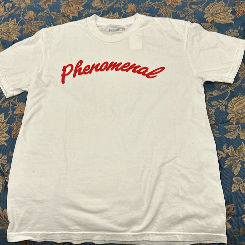 NWT white Phenomenal size medium t-shirt. Phenomenal written in red